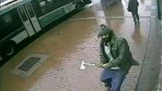 Police try to identify New York police axe-attacker