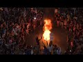 Demonstrators light a bonfire during a protest and scuffle with Israeli police in Tel Aviv