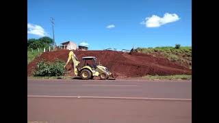 Nivelamento de terreno com Retroescavadeira New Holland B95B