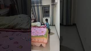 Mischievous Prank: Energetic Chinese Boy Startles Dad