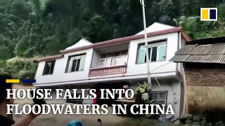 Family watch in terror as their house collapses into floodwaters amid record rains in southern China