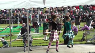 Braemar 2014 - Seann Triubhas - Marielle Lesperance (Ontario) dancing facing the Queen.