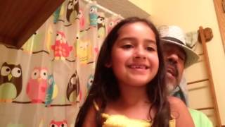 Adorable Granddaughter and Grandfather singing an Oldie