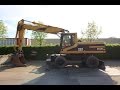 Caterpillar M320 mobile excavator 2001 demonstration