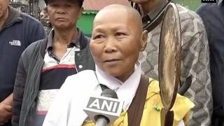 Watch: Buddhist lady walks through Darjeeling streets appealing for peace - ANI News