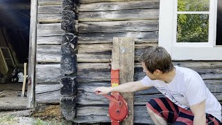 Repairing a wall on a log cabin