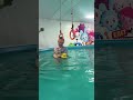 cute baby splashing around in the pool babyswimming firstswim babyinthepool tinyswimmer