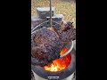 tomahawk steak with garlic butter lobster recipe over the fire cooking by derek wolf