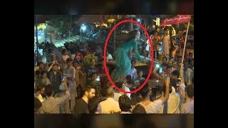Fan of Imran Khan dances atop car in Pakistan; Video goes Viral
