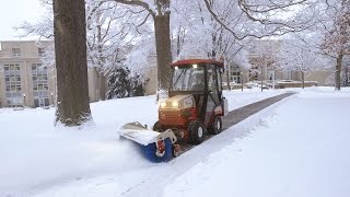 Clearing Snow from Walking Paths of College Campus