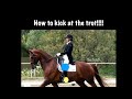 How do you kick a horse in trot?