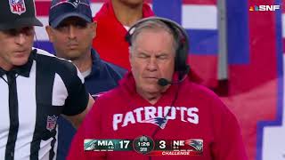 Bill Belichick spikes his challenge flag into the ground