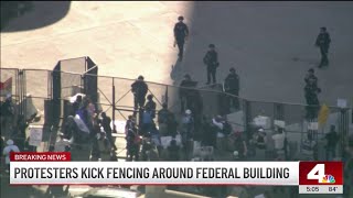 Protesters surround LA federal building amid ‘No Kings' protests