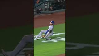Trea Turner is SO SMOOTH with it! Makes sliding catch look SO cool!