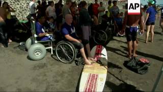 Disabled people take on surfing in El Salvador