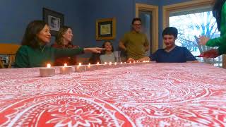 Christmas candle blow challenge but it's lit