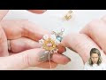 pointed snowflake earrings diy jewelry making tutorial by potomacbeads