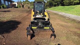 Bobcat with Box Rake / Power Rake