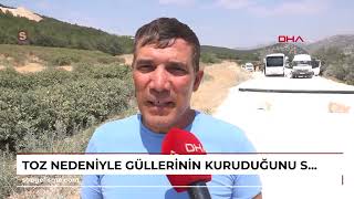 Toz nedeniyle güllerinin kuruduğunu söyleyip, arazisinden geçen yolu kapattı