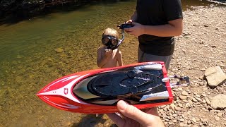 RAN HIM OVER WITH OUR NEW RC BOAT!