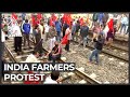 India farmers continue to block key roads to New Delhi