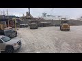 unloading 4 bunker pulp log truck at the chip plant.