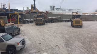 Unloading 4 bunker pulp log truck at the Chip Plant.