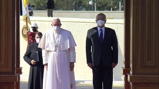 Pope Francis is welcomed by Iraqi President Barham Saleh at presidential palace | AFP