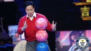 Highest stack of bowling balls - Guinness World Records