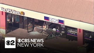 Car crashes into New Jersey storefront