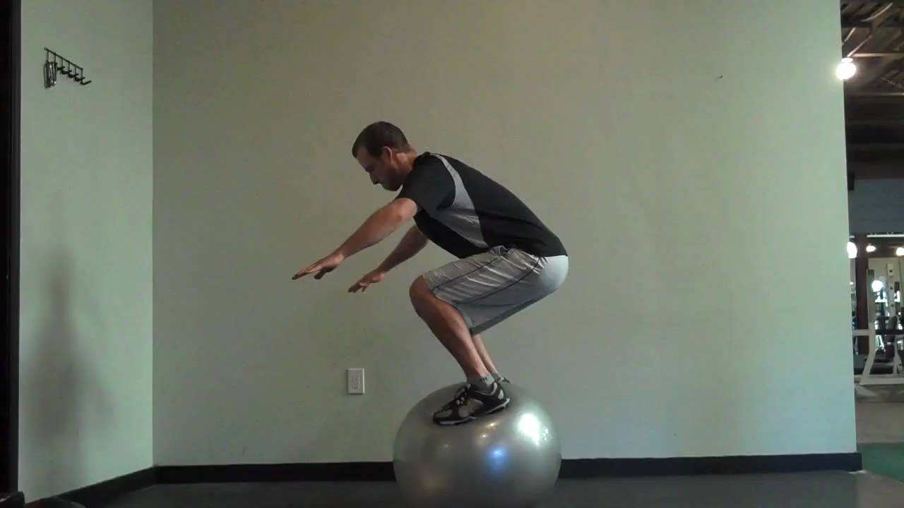 How To Stand On A Stability Ball - Standing On Swiss Ball - YouTube