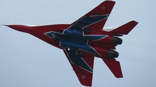 Very smoky Swifts - MiG-29 fly in the group.