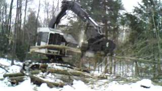 Timbco 445 track machine with rolly head