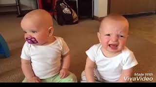 Twin Babies fighting and crying over specifier...., funny babies ever..;}