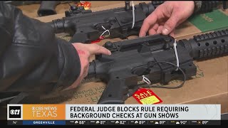 Judge blocks rule requiring background checks at gun shows