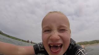 Charlotte bodyboarding at Aberffraw