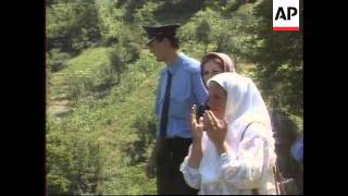 Bosnia- Widows visit Srebrenica looking for graves