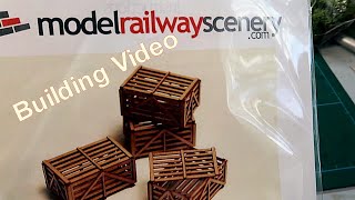 Model railway Scenery, laser cut packing crates. I build some and let you see how it goes.