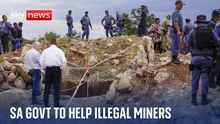 South African minister holds out olive branch to illegal miners in stand-off with police