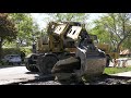 excavator s powerful and precise boom movements demolish and remove curbs gutters and sidewalks