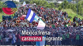 México frena caravana migrante