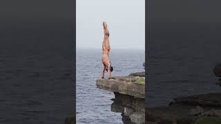 @carlosgimeno15 doing a handstand dive on a 27m cliff 🤯