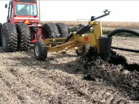 Installing Prinsco farm drainage tile with the Gold Digger tile plow Installing Prinsco farm drainage tile with the Gold Digger tile plow