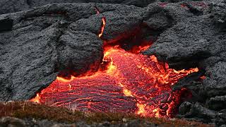 Red Magma Pushing Through Lava Crust in Volcano Eruption.