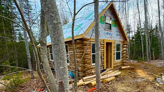 Building an off grid log cabin,working on getting the roof done in a couple of w