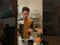 nick jonas making cocktail