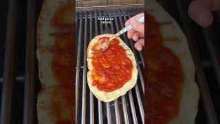 This Grilled Naan Pizza is super easy to make, and a fun way to get the kiddos involved!