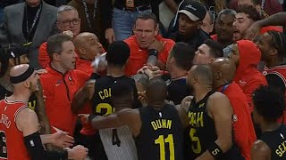 John Collins gets heated with Bulls assistant coach after Collin Sexton got into