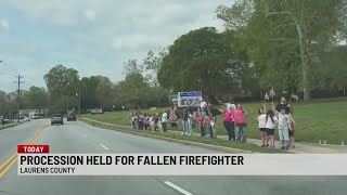 Procession held for fallen firefighter