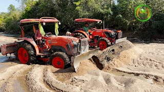 Difficult Two Kubota L5018SP Tractors Pushing Big Woods   Move Wood Out On Sand